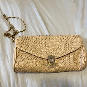 nude clutch with gold chain